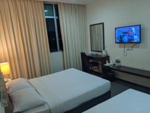 Letto o letti in una camera di The View Hotel
