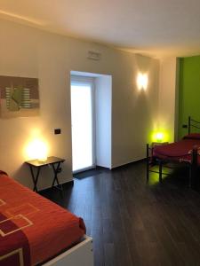 Postel nebo postele na pokoji v ubytování Agriturismo Lucchetti Ferrari