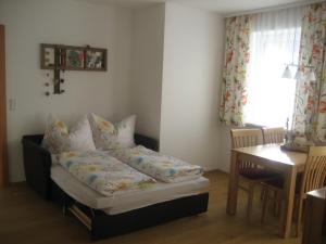 Una cama o camas en una habitación de Appartement Alpenglück