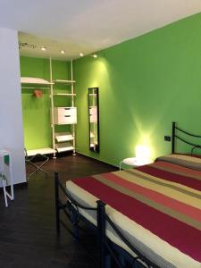 Postel nebo postele na pokoji v ubytování Agriturismo Lucchetti Ferrari
