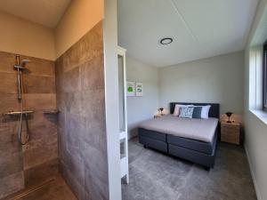 Postel nebo postele na pokoji v ubytování Lutz Watervilla's Balk