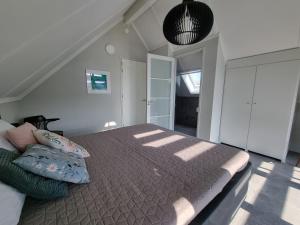 Postel nebo postele na pokoji v ubytování Lutz Watervilla's Balk
