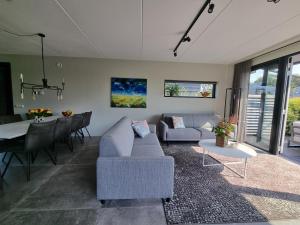 Posezení v ubytování Lutz Watervilla's Balk