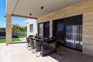 En terrasse eller udendørsområde på Villa Anlero ZadarVillas