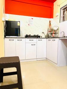 Kuchyň nebo kuchyňský kout v ubytování Okum Guest House