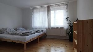Posteľ alebo postele v izbe v ubytovaní Apartman BALA