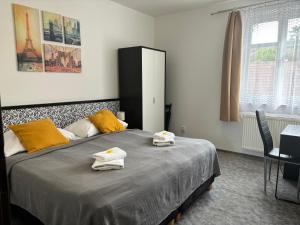 Postel nebo postele na pokoji v ubytování Hotel Pangea