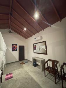 Area soggiorno di Mango Tree House