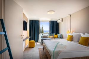 Postel nebo postele na pokoji v ubytování Sunny Makarska by Valamar