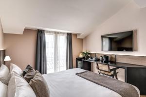 Postel nebo postele na pokoji v ubytování Plinius Lifestyle Hotel Lake Como + 32 fotografií