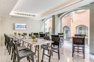 TV a/nebo společenská místnost v ubytování Plinius Lifestyle Hotel Lake Como