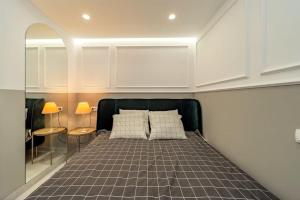 Postel nebo postele na pokoji v ubytování Kovac Spa Belgrade Apartment + 9 fotografií