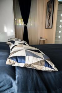 Voodi või voodid majutusasutuse Blue apartment toas