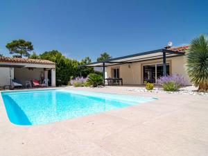 a swimming pool in front of a house at Holiday Home Villa D'Allongue by Interhome in Callian +25 photos