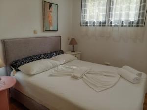 Posteľ alebo postele v izbe v ubytovaní Ostria Apartments Kalives