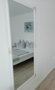 Postel nebo postele na pokoji v ubytování Levendula Porta