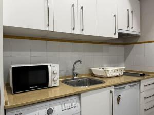Kuchyň nebo kuchyňský kout v ubytování Loft El Capricho Grupo Ac Gestion