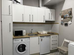 Kuchyň nebo kuchyňský kout v ubytování Loft El Capricho Grupo Ac Gestion