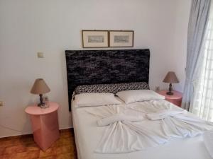 Posteľ alebo postele v izbe v ubytovaní Ostria Apartments Kalives