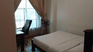 Giường trong phòng chung tại EXCELLENT HOTEL KAMPAlA