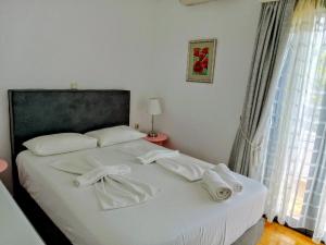 Posteľ alebo postele v izbe v ubytovaní Ostria Apartments Kalives