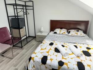 Cama ou camas em um quarto em Appartement Bes,, Attique neuf avec confort