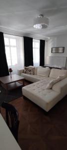 Posezení v ubytování U Obecního dvora - Old Town Apartment + 3 fotografie
