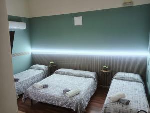 A bed or beds in a room at Al Duomo