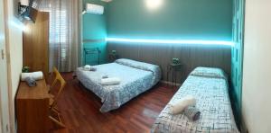 A bed or beds in a room at Al Duomo