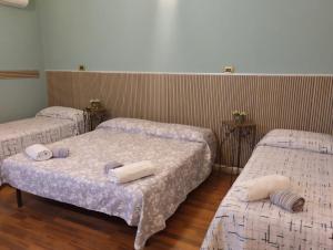A bed or beds in a room at Al Duomo