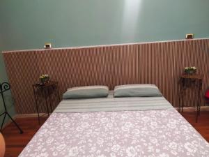 A bed or beds in a room at Al Duomo