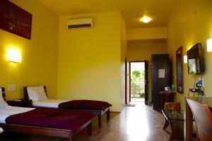 Μια τηλεόραση ή/και κέντρο ψυχαγωγίας στο The Yellow Retreat