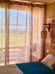 Voodi või voodid majutusasutuse CAPAO Beach Hôtel toas