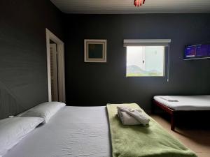 Espaço Verano - Suítes客房内的一张或多张床位
