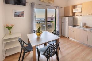 Kuchyňa alebo kuchynka v ubytovaní Apartments Gianni