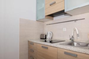 Kuchyňa alebo kuchynka v ubytovaní Apartments Gianni