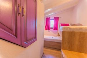 Posteľ alebo postele v izbe v ubytovaní House Rusti