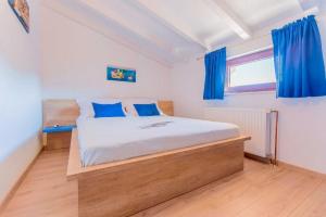 Posteľ alebo postele v izbe v ubytovaní House Rusti