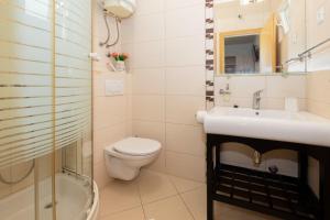 Kúpeľňa v ubytovaní Apartments Gianni