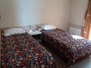 Postel nebo postele na pokoji v ubytování My Batumi Apartments