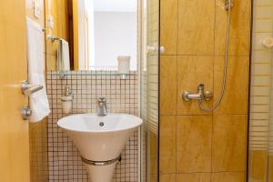 Kúpeľňa v ubytovaní Apartments Gianni