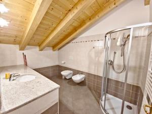 Kúpeľňa v ubytovaní Rossetti Big by AMA Val di Fassa + 5 fotografií