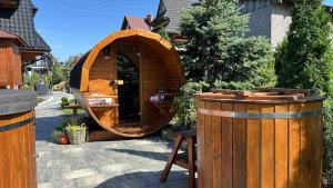 Vonkajšia záhrada v ubytovaní Apartamenty Dwupoziomowe Na Dwa Widoki z Jacuzzi & Sauna