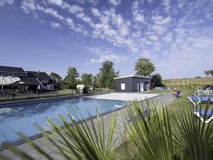 Bazén v ubytování Holiday Home Sunset by Interhome nebo v jeho okolí
