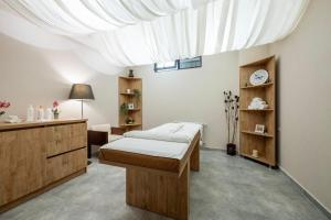 Voodi või voodid majutusasutuse Kristal bakuriani Resort C block 202 toas