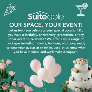 a white wedding cake with pink flowers on a blue background at Elegant Retreat with Stunning Burj Khalifa Views in Dubai +32 photos