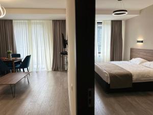 Voodi või voodid majutusasutuse Kristal bakuriani Resort C block 202 toas