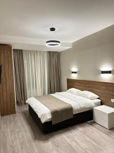 Voodi või voodid majutusasutuse Kristal bakuriani Resort C block 202 toas