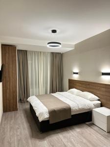 Voodi või voodid majutusasutuse Kristal bakuriani Resort C block 202 toas