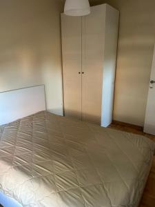 a bedroom with a bed and a closet at Ana in Smederevo